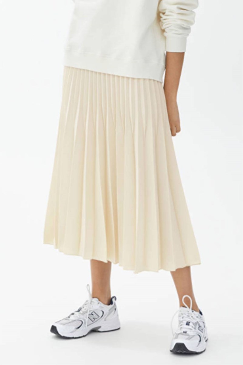 Πλισέ φούστα: 20 σχέδια για easy-chic, καλοκαιρινές εμφανίσεις που θα συζητηθούν - εικόνα 14