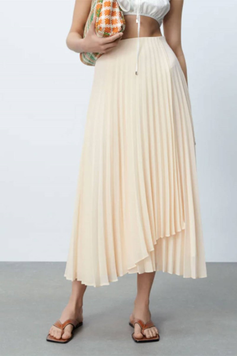 Πλισέ φούστα: 20 σχέδια για easy-chic, καλοκαιρινές εμφανίσεις που θα συζητηθούν - εικόνα 10